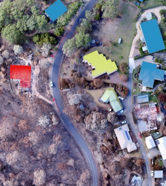 Aerial view of bushfire-affected homes