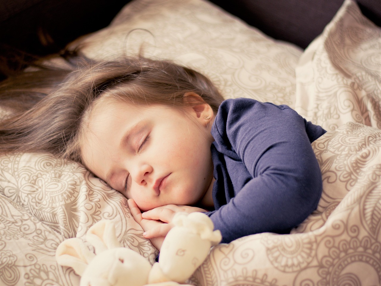 CC-0. https://pixabay.com/photos/baby-girl-sleep-sleeping-asleep-1151351/