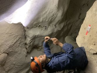 Dr Jalandoni studies finger flutings at an Australian cave site