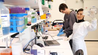 Dr Katherine Zulak (left) and Ms Lina Farfan Caceres (right) sorting through sam