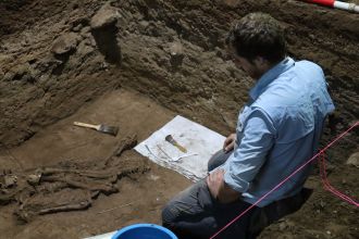 Dr Tim Maloney takes in the discovery of the ancient skeletal remains.