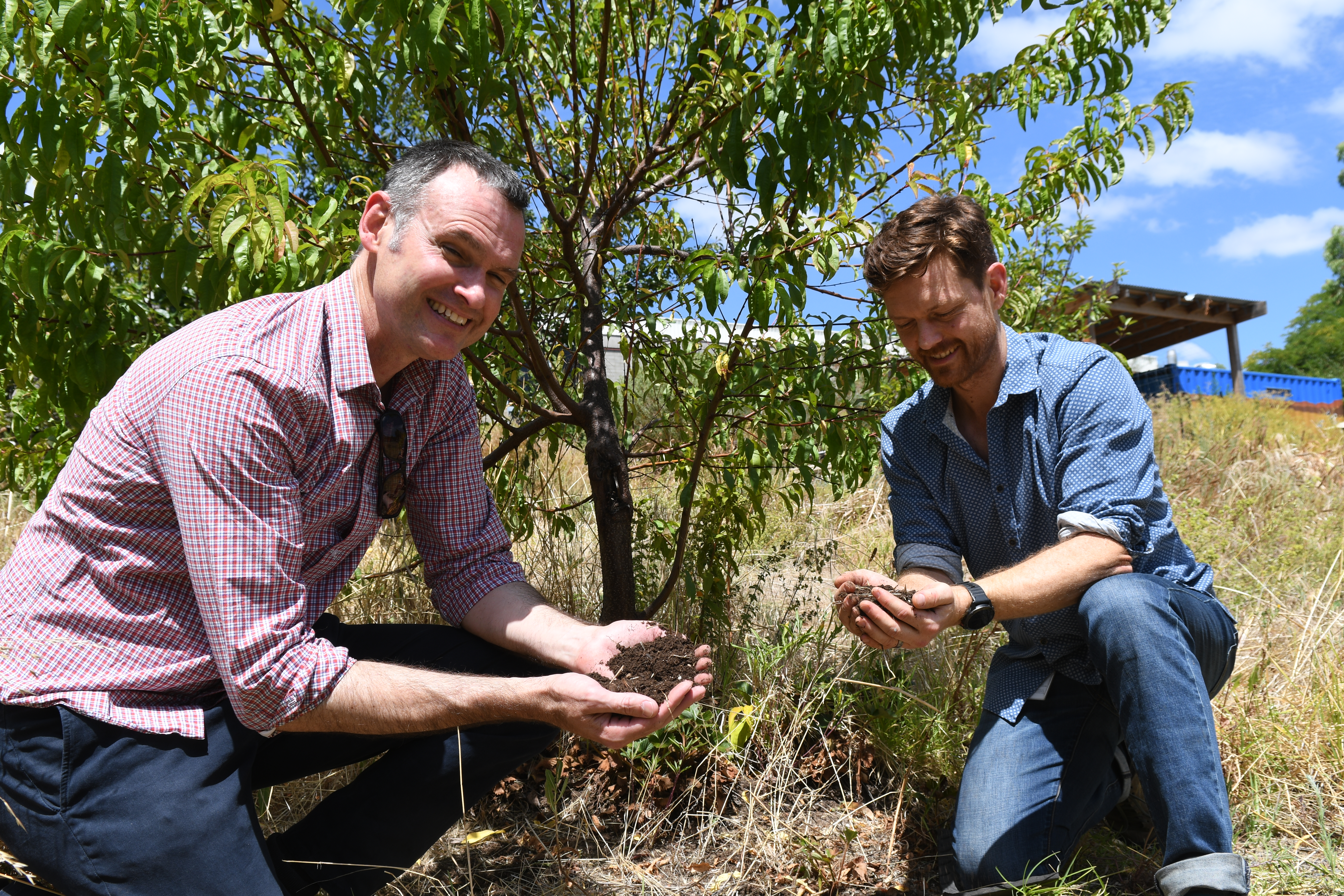 Dr Craig Liddicoat, left, and Associate Professor Martin Breed with one of the edible gardens established for students and staff at Flinders University’s Bedford Park campus in Adelaide, South Australia. 