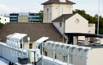 Painted tiles being tested on the roof of the Sydney Nanoscience Hub. 