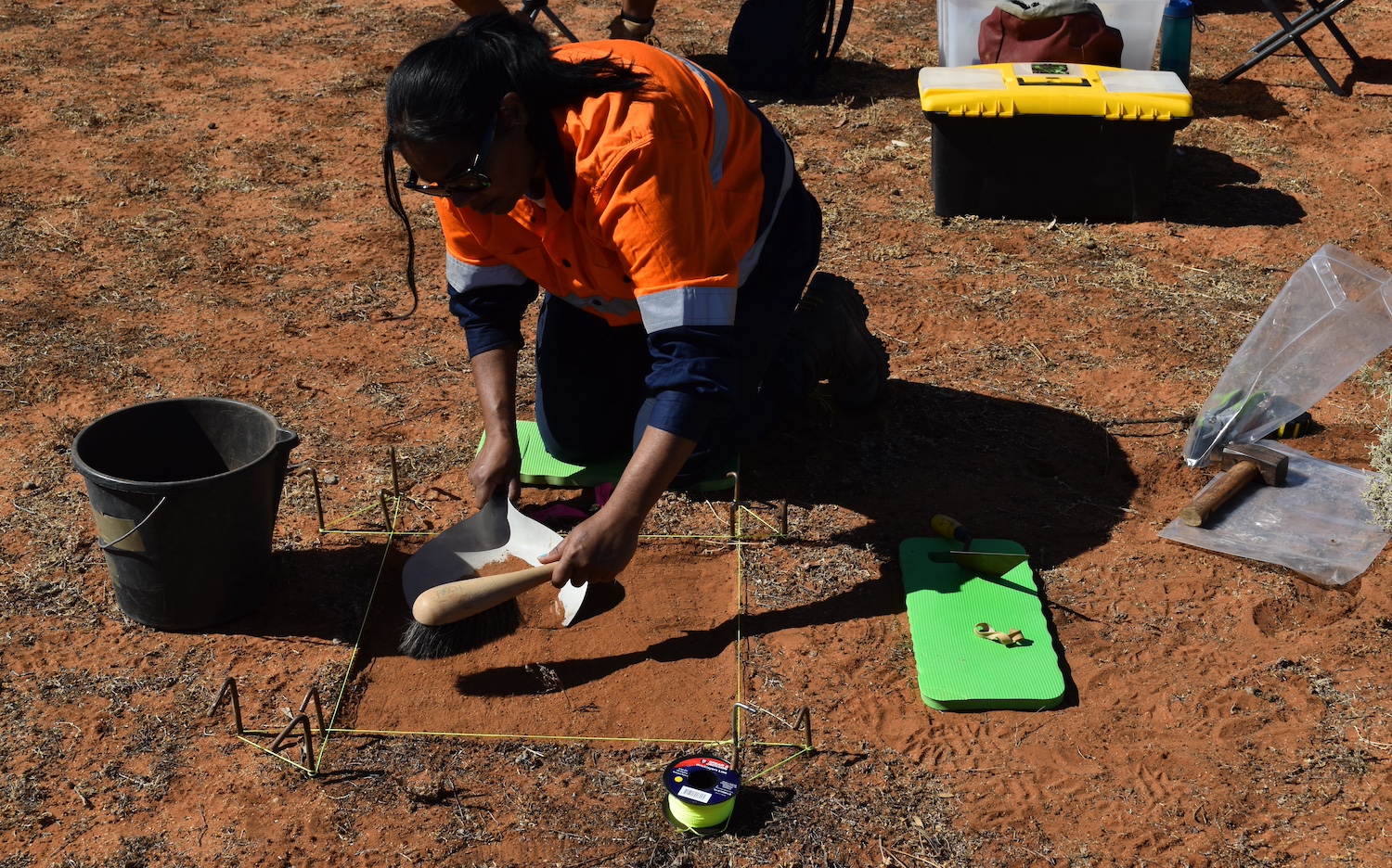 River Murray and Mallee Aboriginal Corporation member Melissa Johnson commencing the archaeological excavation at Sugarloaf Hill. Image courtesy of the River Murray and Mallee Aboriginal Corporation.