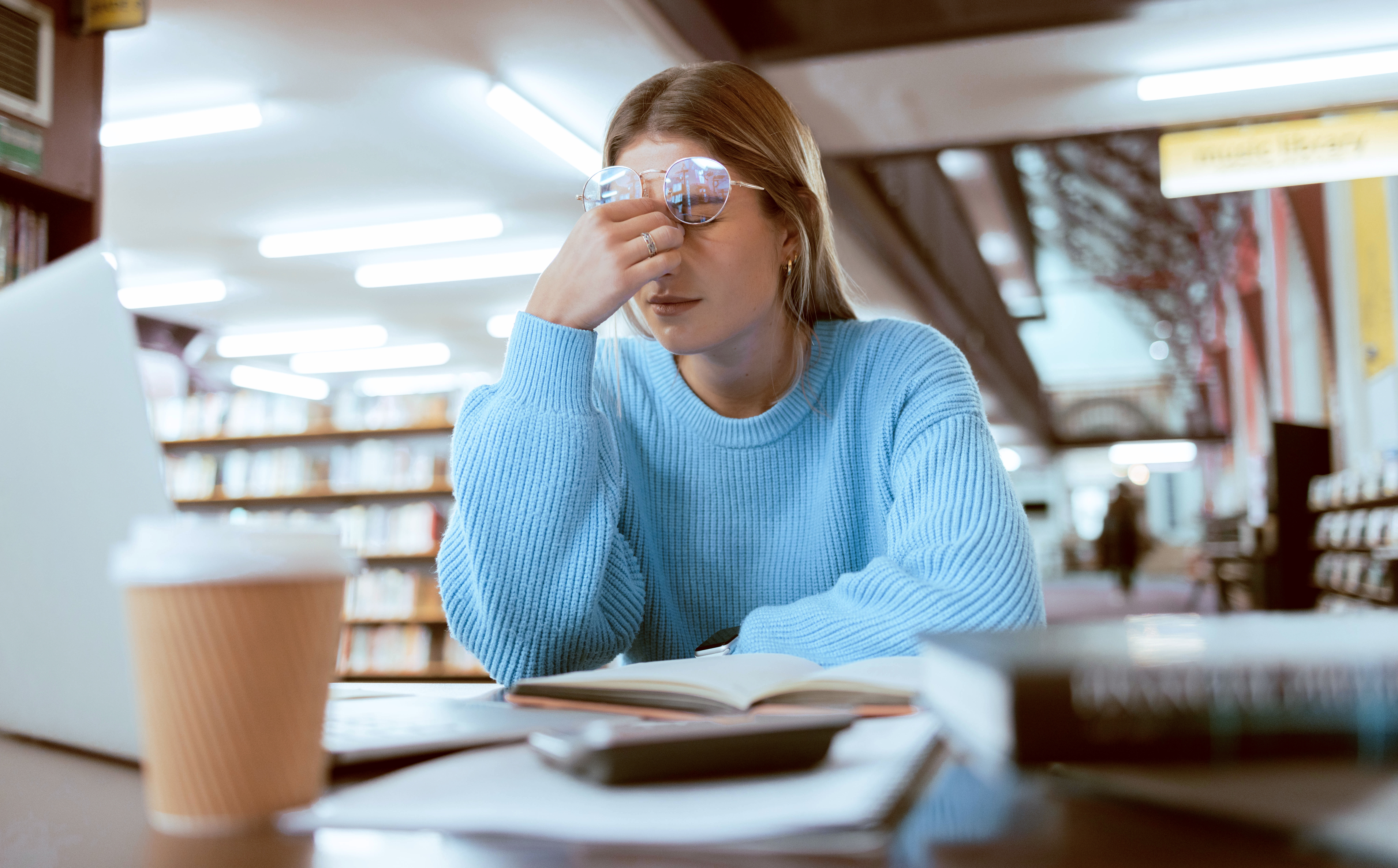 Woman stressed at university. Via Adobe Stock