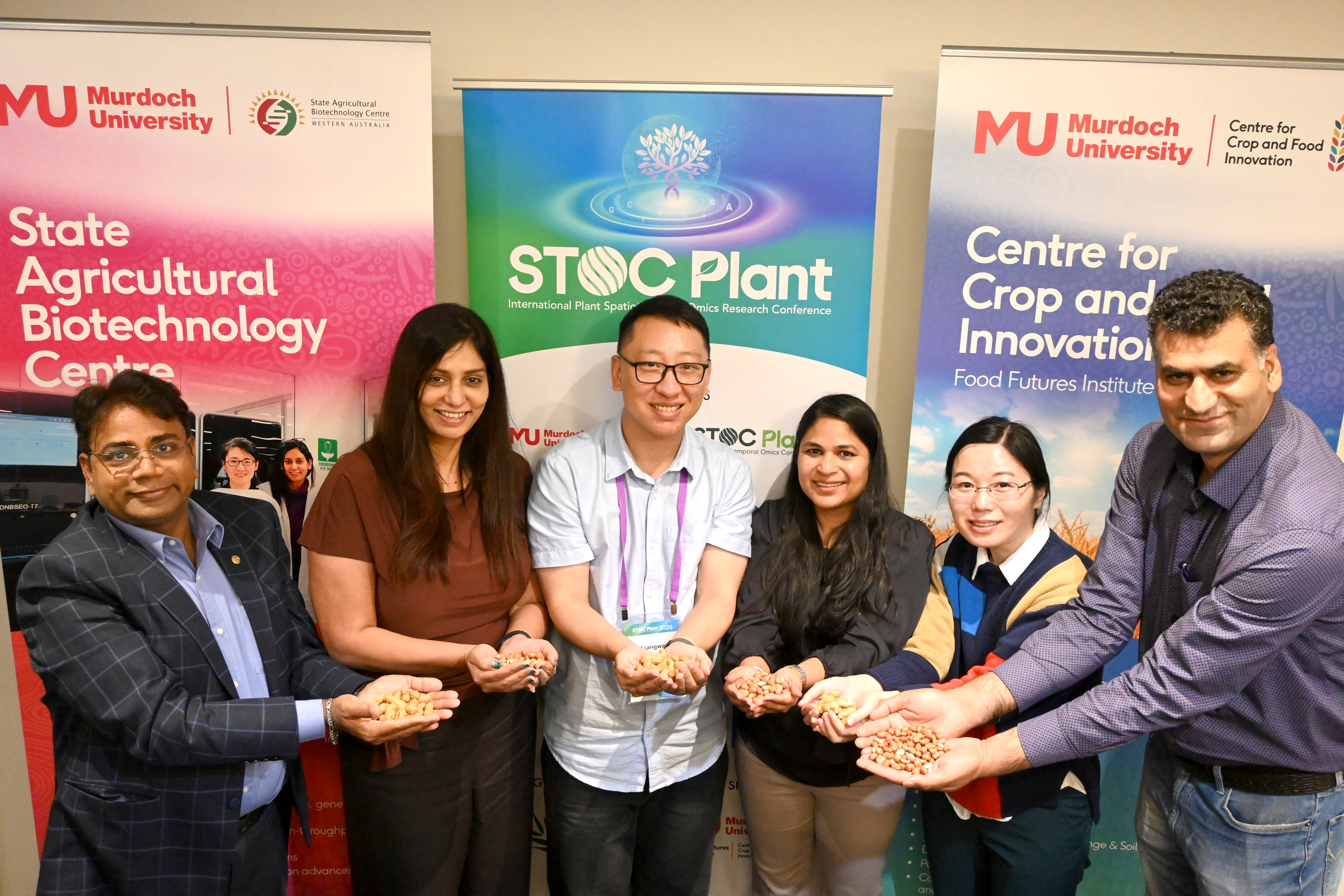 Prof Rajeev Varshey FRS FAA, CCFI co-authors and lab members display peanuts at STOC Plant 2026.