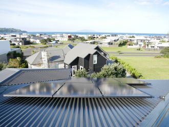 Extra power generated by NZ's home solar panels could produce environmentally friendly or 'green' hydrogen to help meet decarbonisation targets, researchers say. Their models looked at power needs and the areas available for residential rooftop solar panels in Auckland and Christchurch, to see how much electricity might be left over. Even with increasing use of electricity for the likes of EVs and heat pumps, there was extra electricity generated in summer that could be used to make hydrogen for power storage, transport fuel, or fertiliser manufacturing. As the technology gets cheaper, the study authors say this green hydrogen could become comparable in cost to hydrogen produced from natural gas.