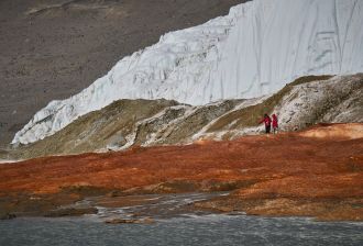 Researchers of this study collecting samples at Blood Falls