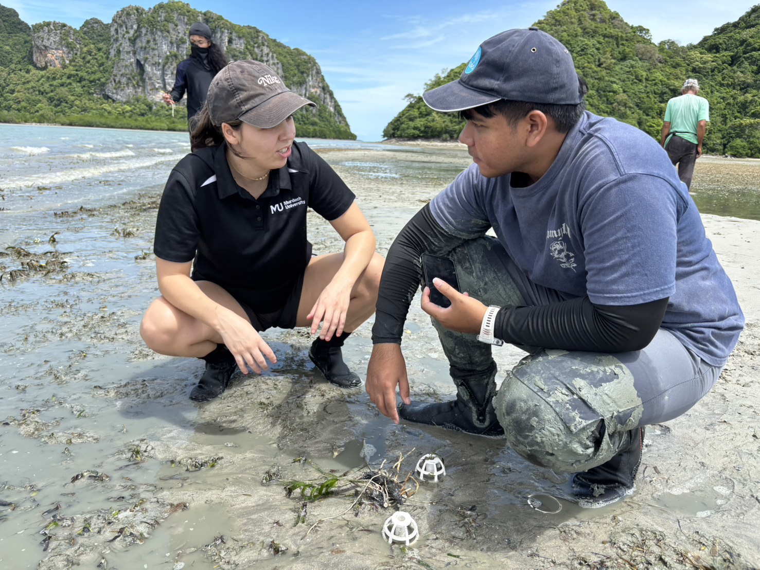 Dr. Alexandra Gulizia (left) and Patsakorn Jeenchuay (right) test prototype biodegradable seagrass seed pods ahead of a full field trial in Satun Province. (Walailak University).
