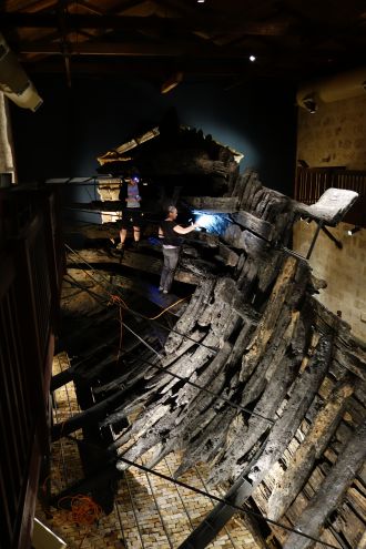 Working to extract a tree-ring samples from the Batavia ship’s transom beams at