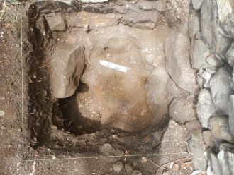 Excavation of a pit that contained large amounts of bone, shellfish, glass etc