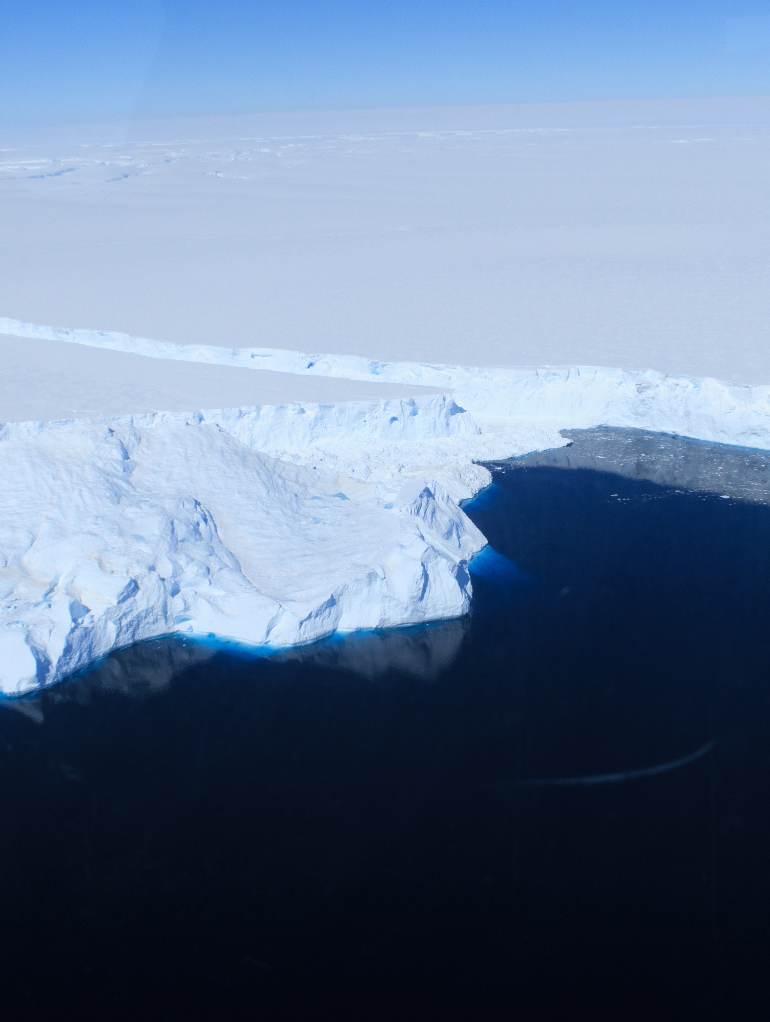 Caption: Aerial view of the Totten Ice Shelf during the 61st Japanese Antarctic Research Expedition in late 2019 and early 2020. Totten experienced East Antarctica’s most significant ice loss through 2021, followed by a marked slowdown during 2021–2023.  Credit: Dr. Yoshihiro Nakayama