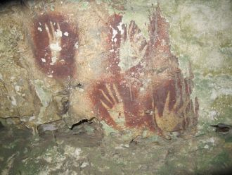 Narrowed finger hand stencils in Leang Jarie, Maros, Sulawesi
