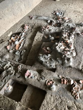 Archaeological burials with associated artifacts at Nong Ratchawat