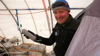 Dave Etheridge with a precious bottle of ancient air.