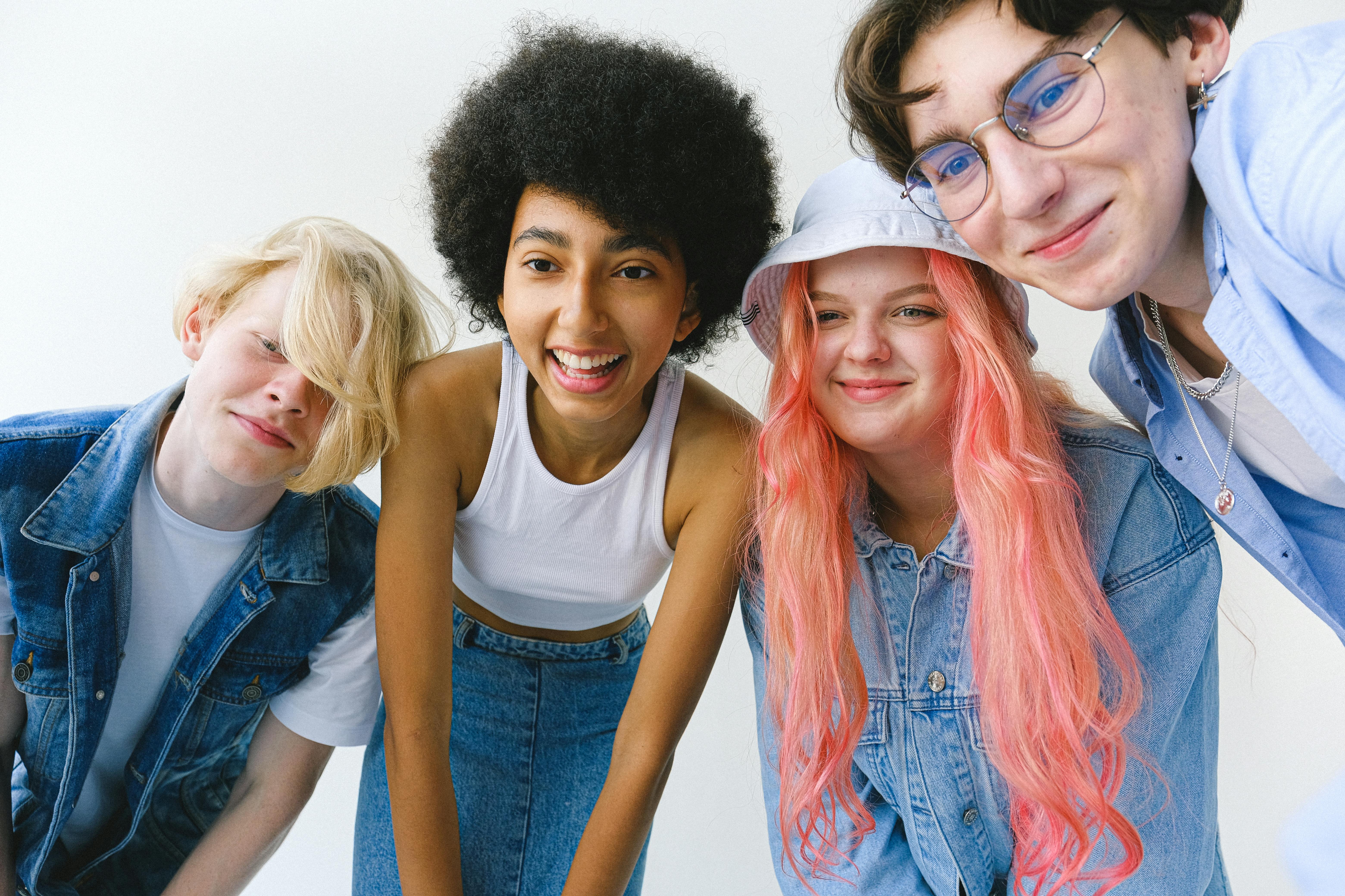 CC-0. https://www.pexels.com/photo/multiethnic-teenagers-on-white-background-looking-away-5325742/