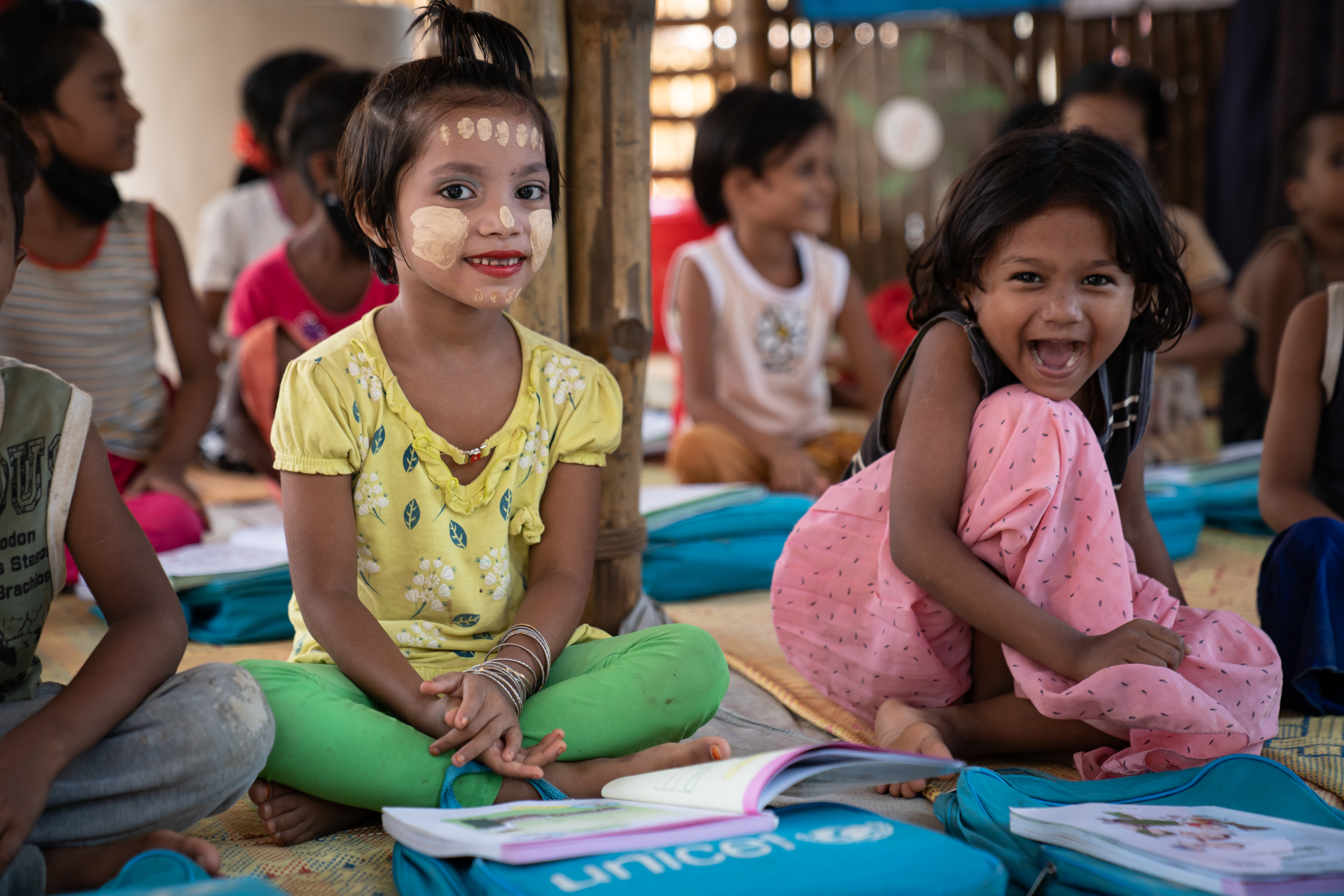 Rohingya girls study the Myanmar curriculum at the UNICEF learning centre in the refugee camps in Bangladesh. Credit: © UNICEF/UN0688031/Lateef