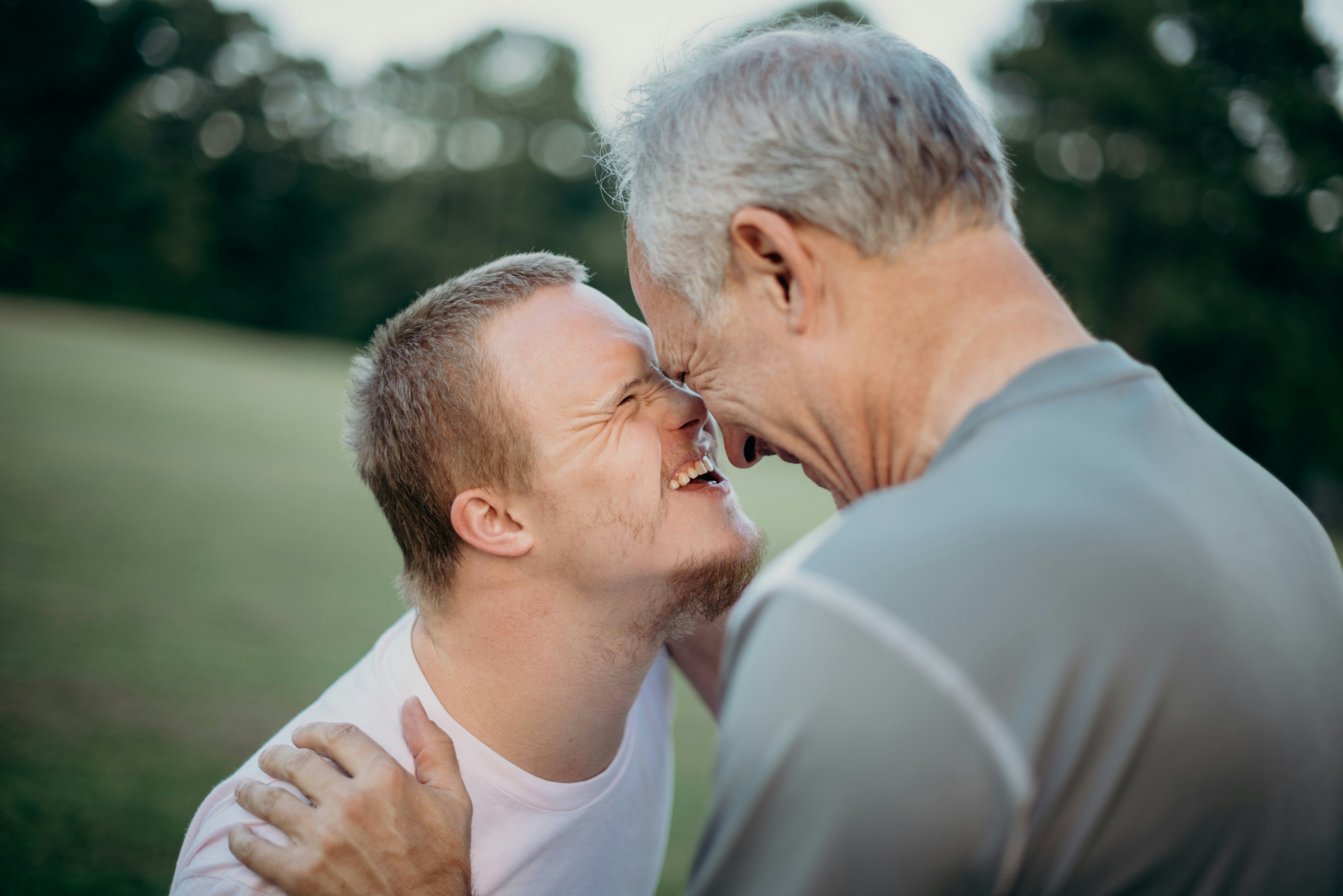 CC-0. https://unsplash.com/photos/two-man-talking-to-each-other-on-grass-field-J3Xjyg5m8kY