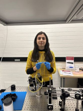 Maryam Setareh holding a solenoid beam metasurface filter