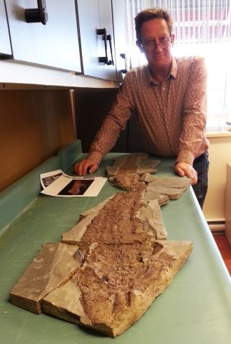 Professor John Long with Elpistostege fish fossil 