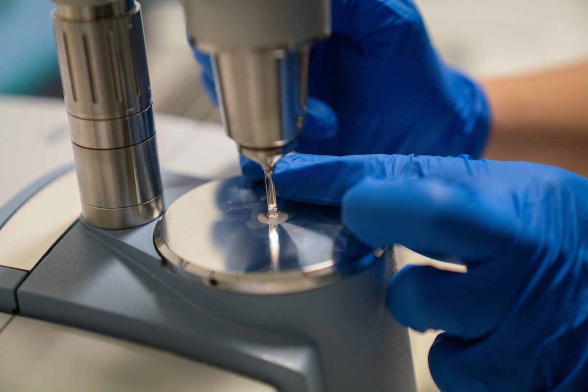 A CanTEST worker analysing an unknown white substance. Photo: Nic Vevers/ANU