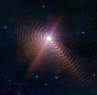 JWST image of concentric dust rings emanating from the WR140 binary