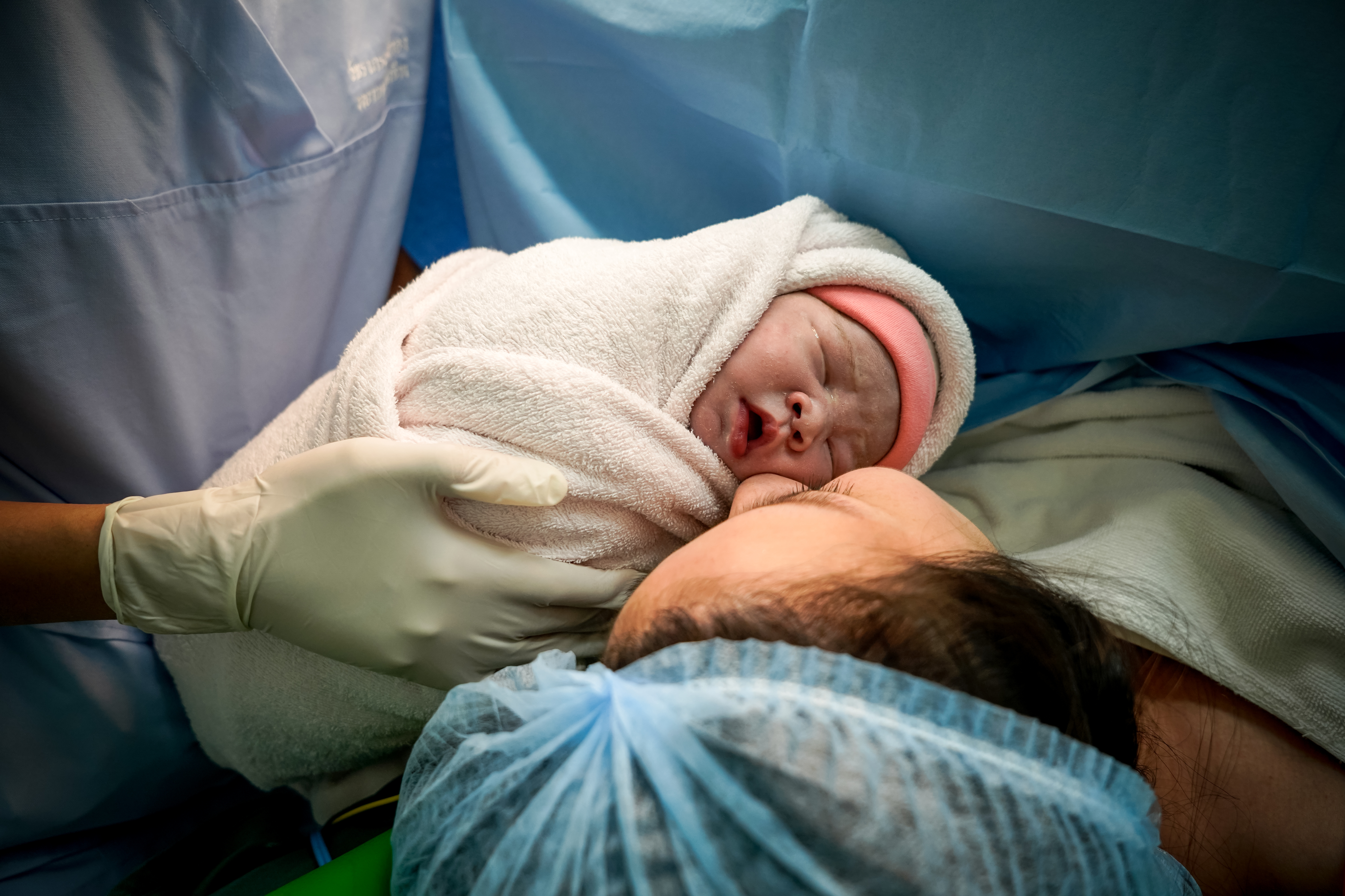 Description: Mother and newborn after birth. Credit: Supawat Eurthanaboon/Shutterstock.com
