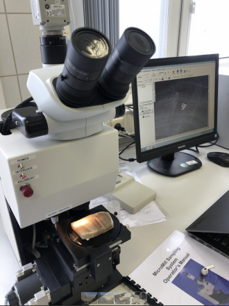  The speleothem being analysed under the microscope.