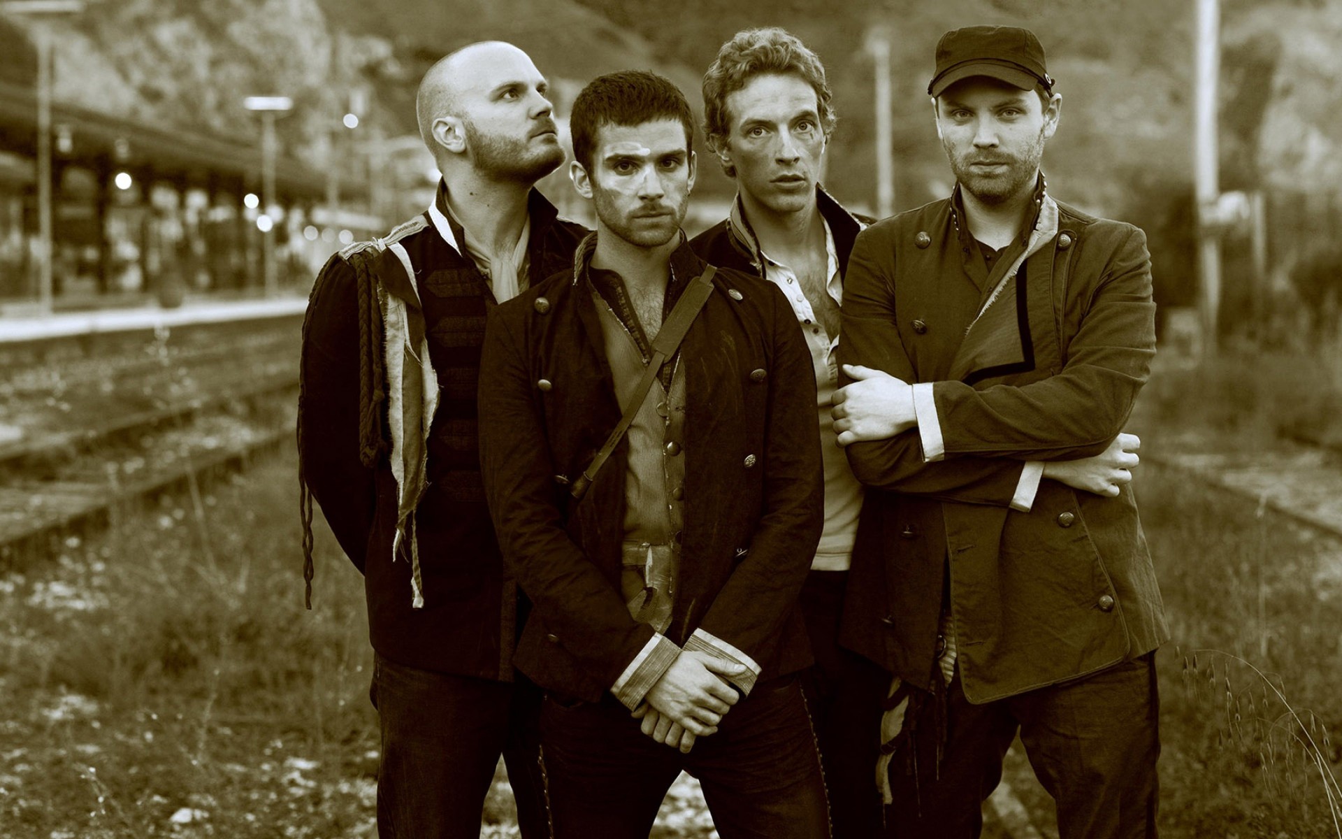 CC-0. https://www.hdwallpapers.net/download/coldplay-band-sepia-wallpaper-for-1920x1200-71-304.htm