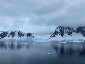 Mountains and icebergs along the coast of the Antarctic Peninsula