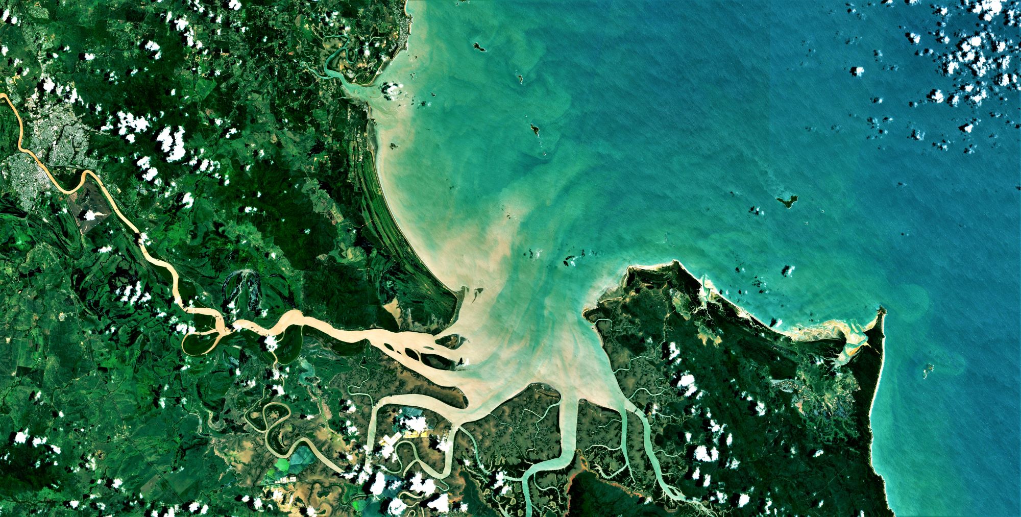 Satellite image from Sentinel Hub showing sediment flow from the Fitzroy River out to Keppel Bay and the Southern Great Barrier Reef. Credit: European Union, contains modified Copernicus Sentinel data 2023, processed with EO Browser.