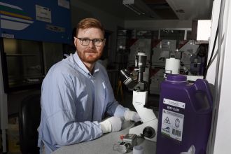 University of Newcastle Associate Professor Matt Dun in laboratory.