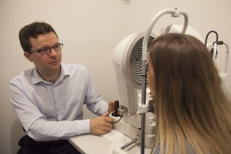 Dr Leigh Plowman with a  patient