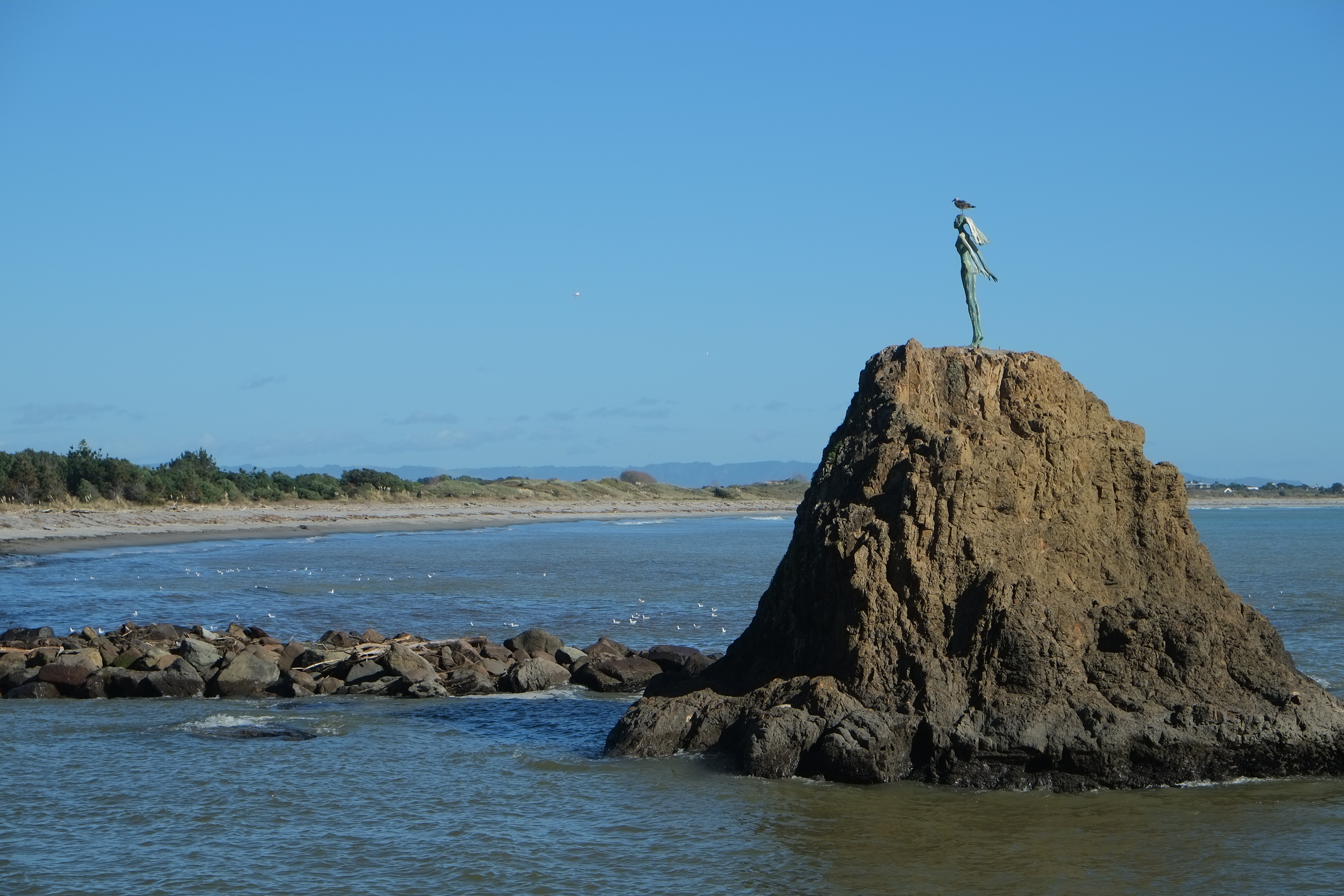 The Statue of Wairaka (also known as The Lady on the Rock), located at Whakatāne Heads in Whakatāne. Wikimedia Commons