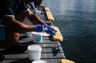 Collecting water samples from the estuary at Yamba on the NSW North Coast.