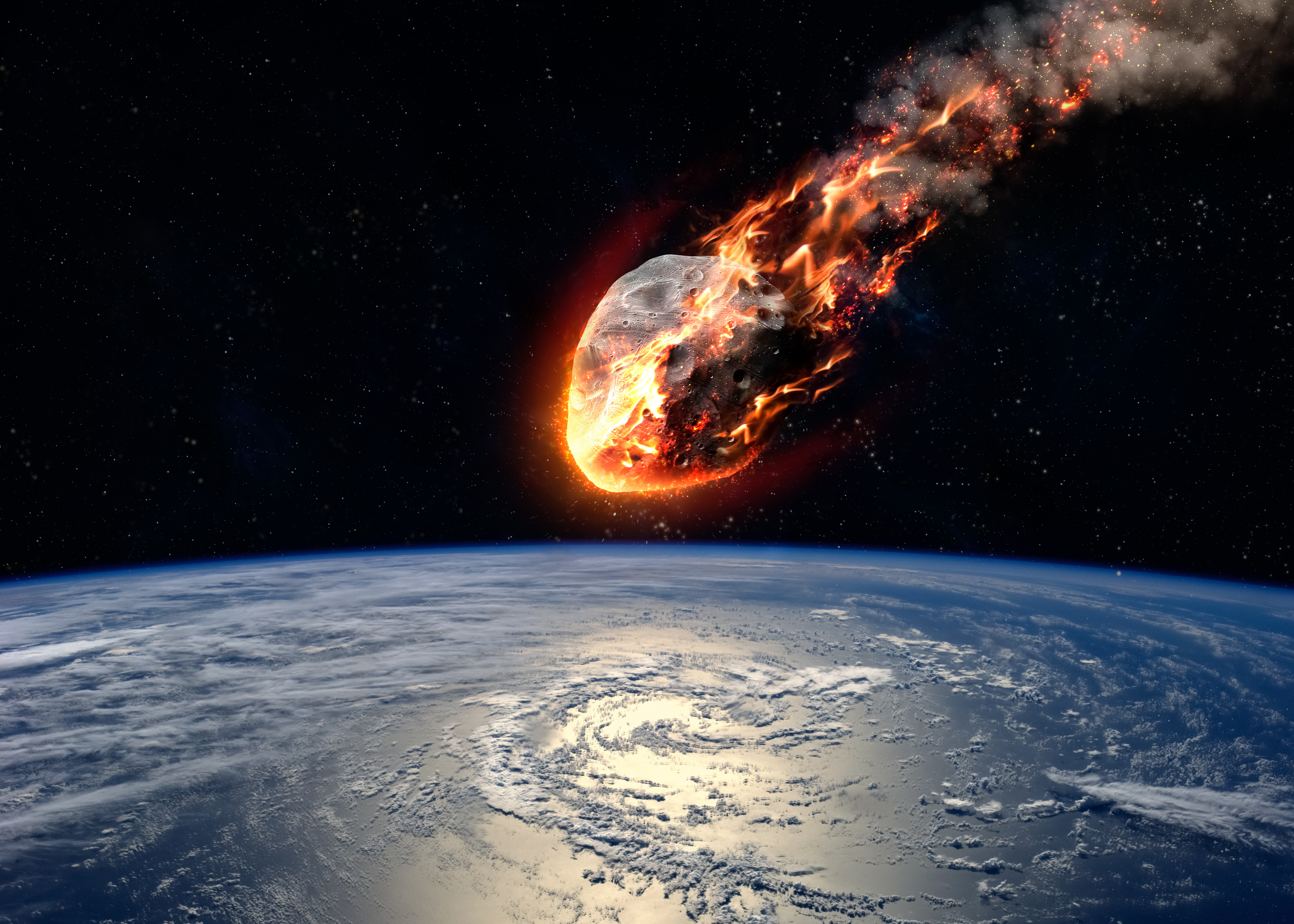 Meteor glowing as it enters the Earth's atmosphere By Vadimsadovski, Adobe Stock