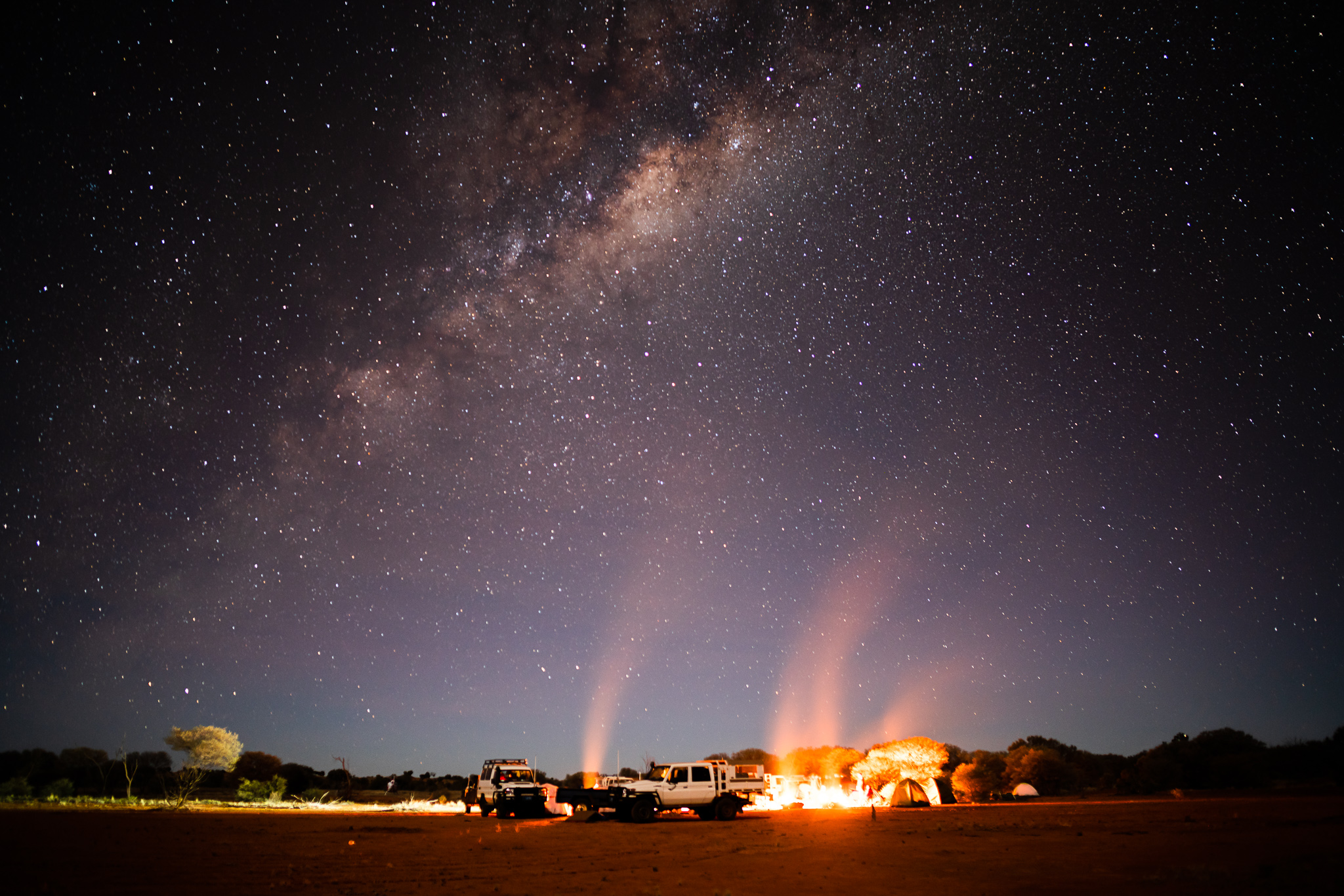 Central Land Council rangers camping under the desert sky on Haast Bluff Aboriginal Land Trust. Photo: Indigenous Desert Alliance