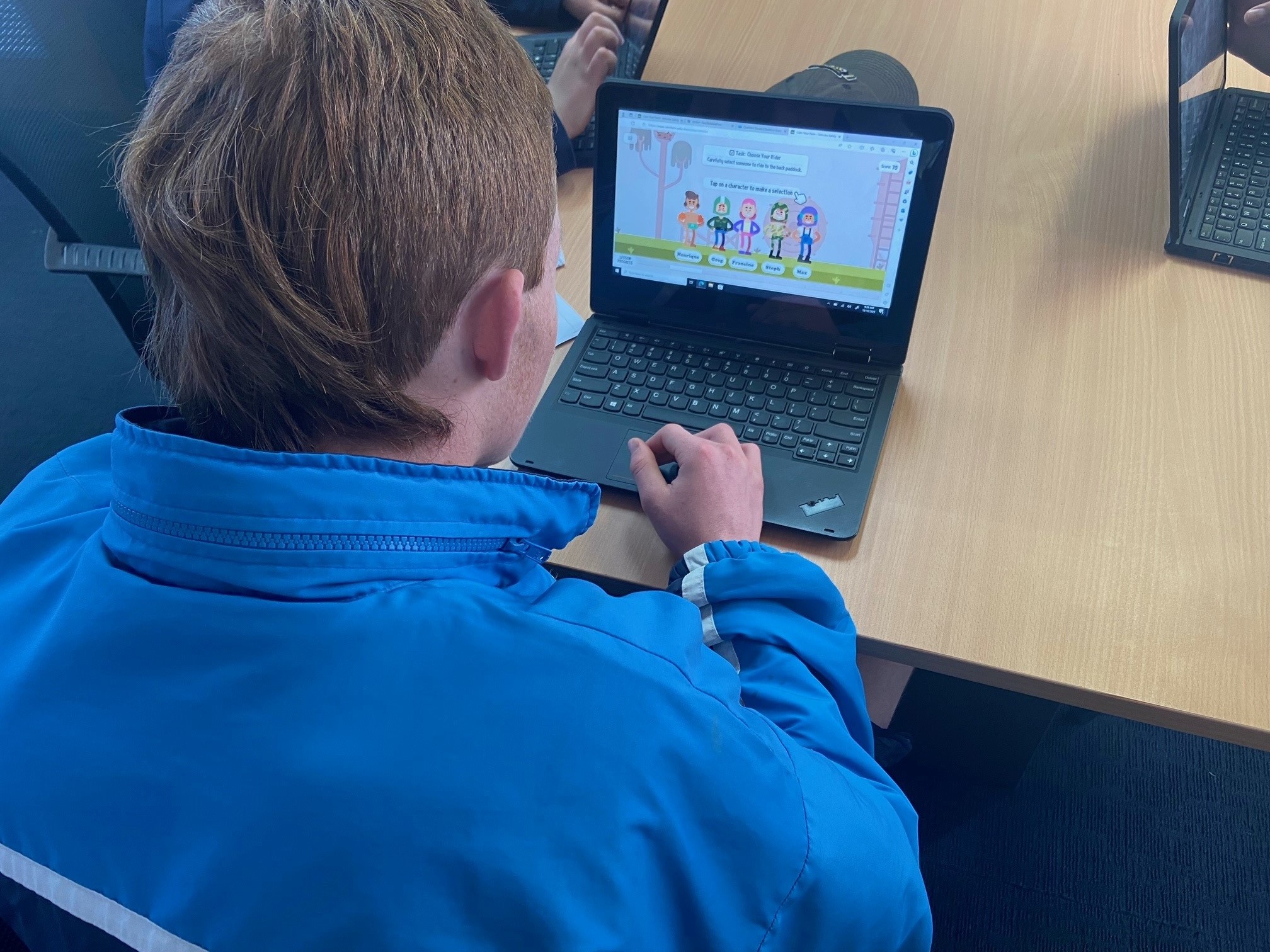 Students at rural and regional high schools, for example this boy from Exeter High School in Tasmania, can play ‘Calm Your Farm’ to learn about farm safety. Photo: Supplied. 