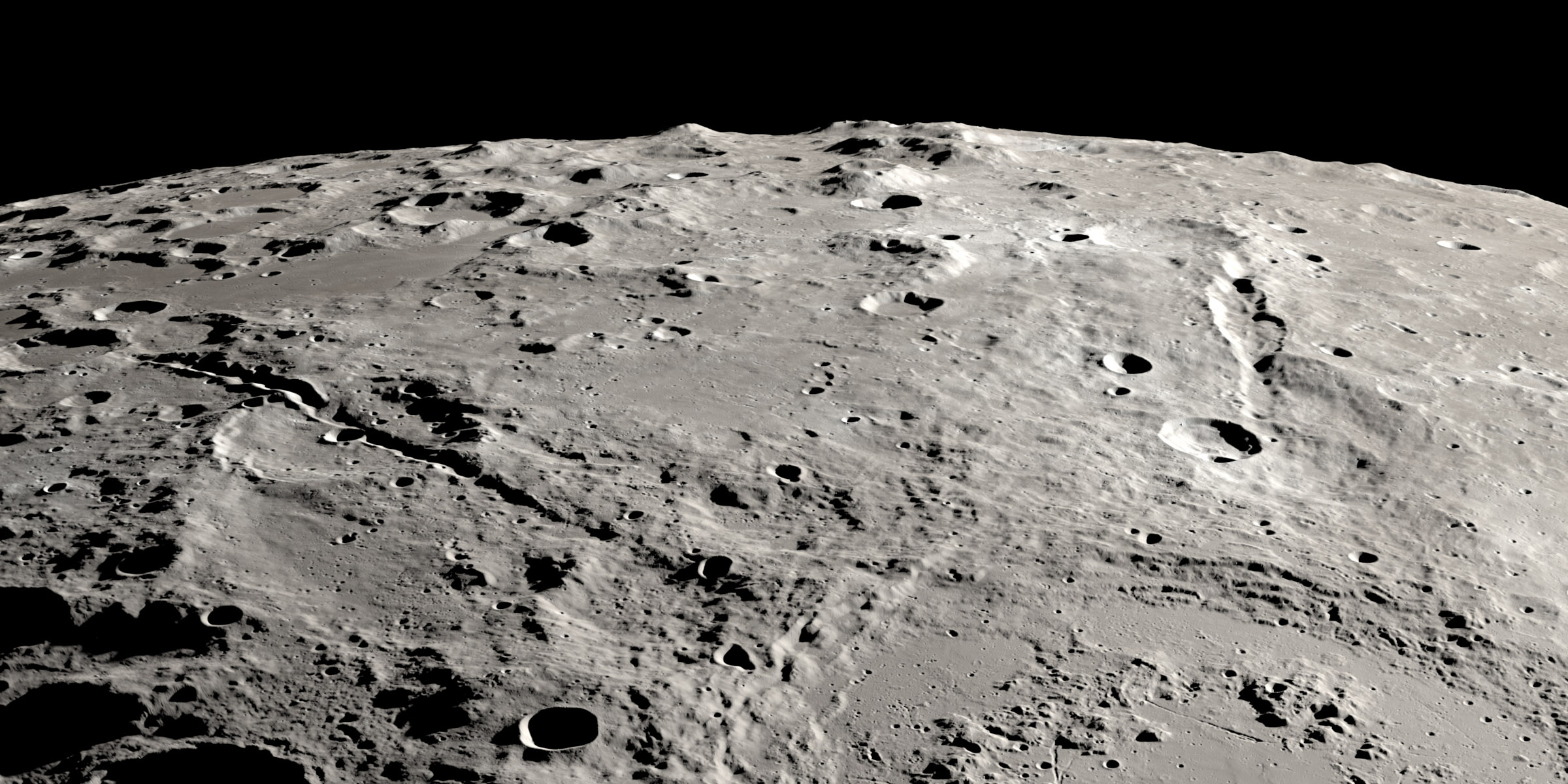 Image 2: Caption: View of two grand canyons on the Moon radiating from the Schrödinger impact basin near the lunar south pole on the lunar far side.  View is from orbit looking obliquely across the surface, like an astronaut in an approaching spacecraft.  Credit: NASA\SVS\Ernie T. Wright.