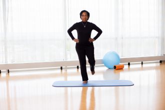 Person balancing on one leg