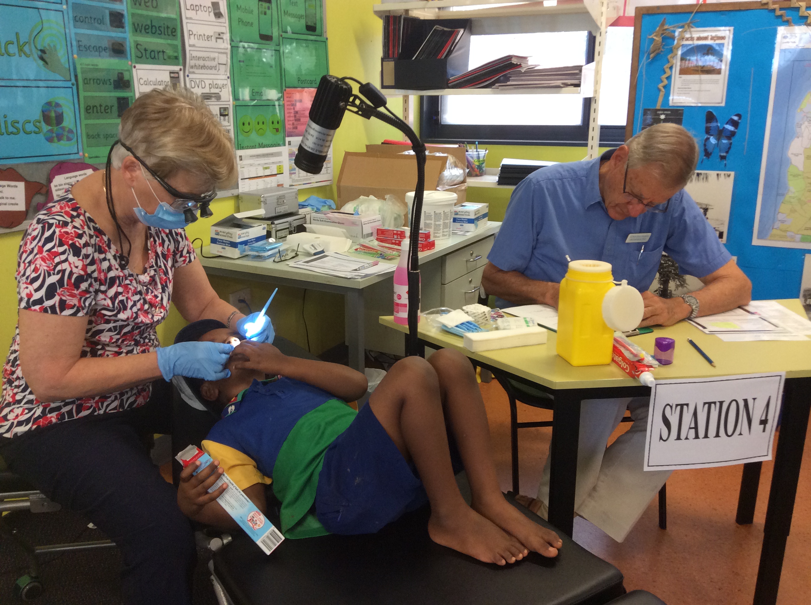 A participant being examined by the research team in the library of the local primary school.