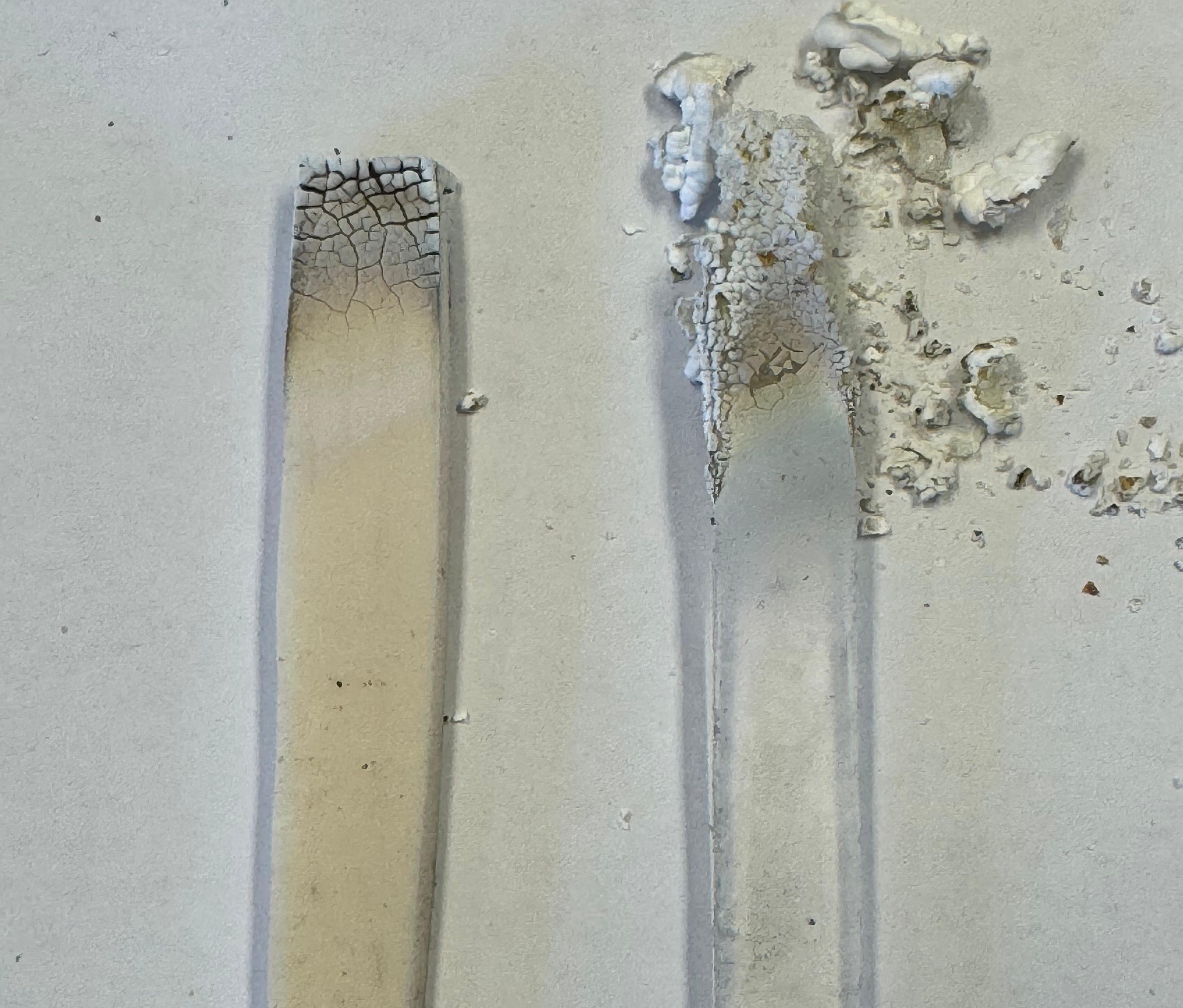 Side-by-side comparison: The team's proposed power pole insulation material (left) next to silicone following a fire-resistance experiment. Credit: Supplied by the research team