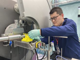 Dr Gemeng Liang uses the Powder diffraction beamline 