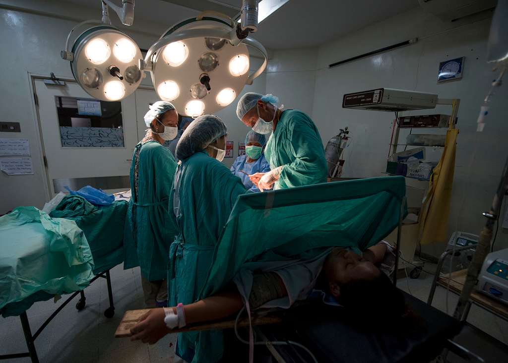 CC-0. https://boudewijnhuijgens.getarchive.net/media/capt-timothy-sayles-and-guatemalan-medical-professionals-perform-a-cesarean-f53d69