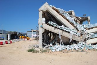 Partially collapsed full-scale precast building after testing 2