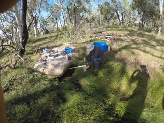 Dr Dylan Irvine collecting spring samples 