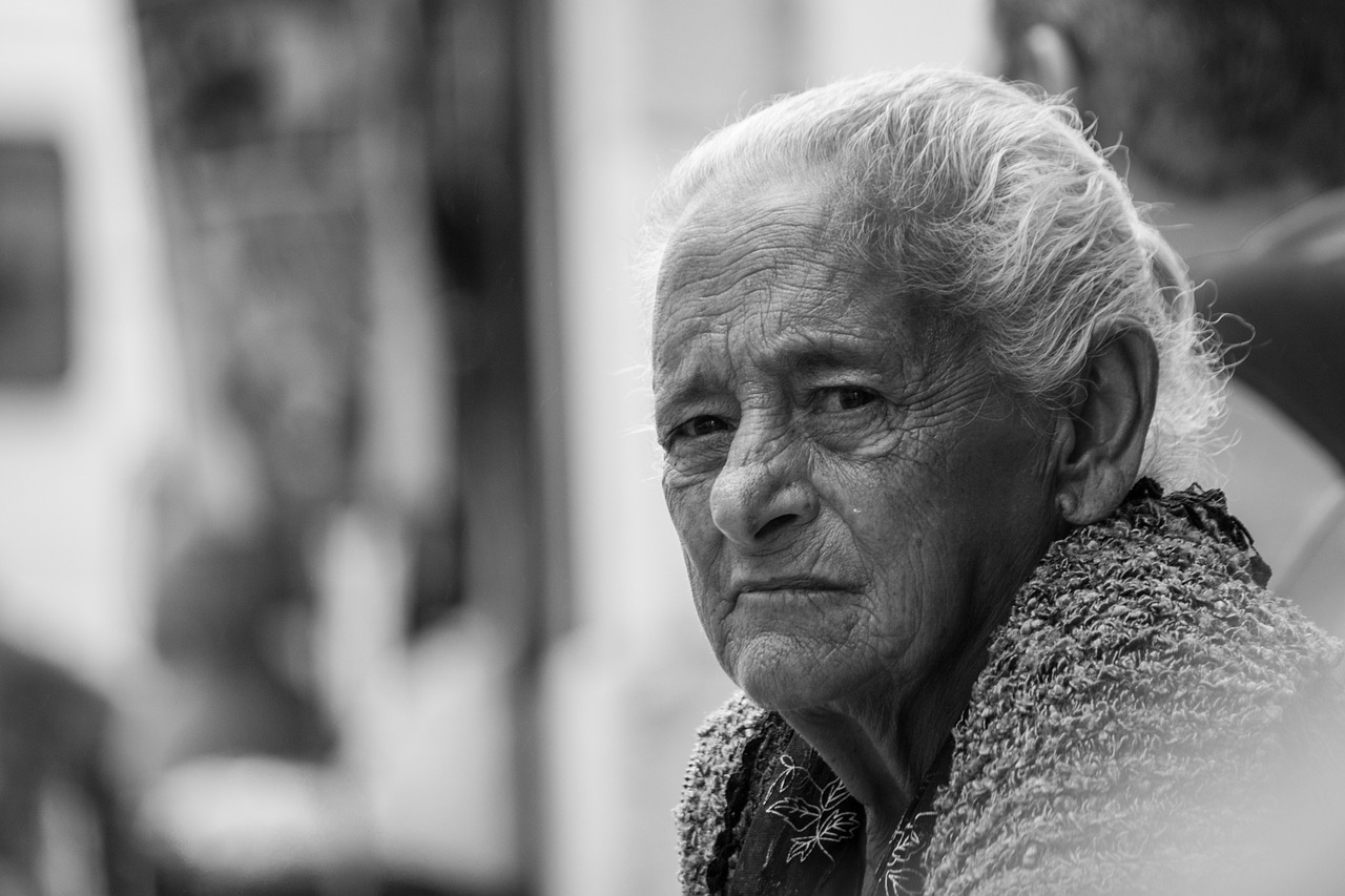 CC-0.https://pixabay.com/photos/lisbon-old-lady-skeptical-1143729/