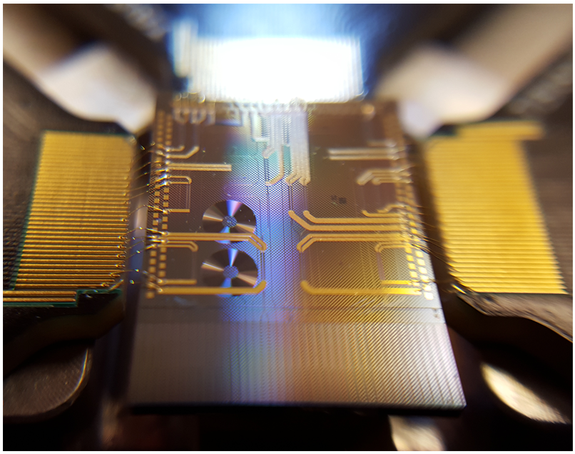 Integrated optical microcomb chip. Credit: David Moss