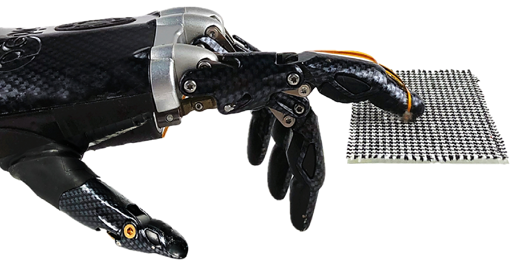 Texture recognition by slipping the slip sensor on a textile. Credit: Chuan Fei Guo