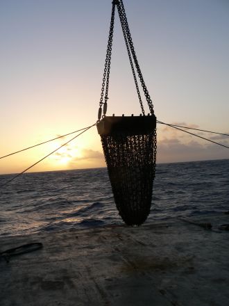 Metal dredge basket used to recover rock samples